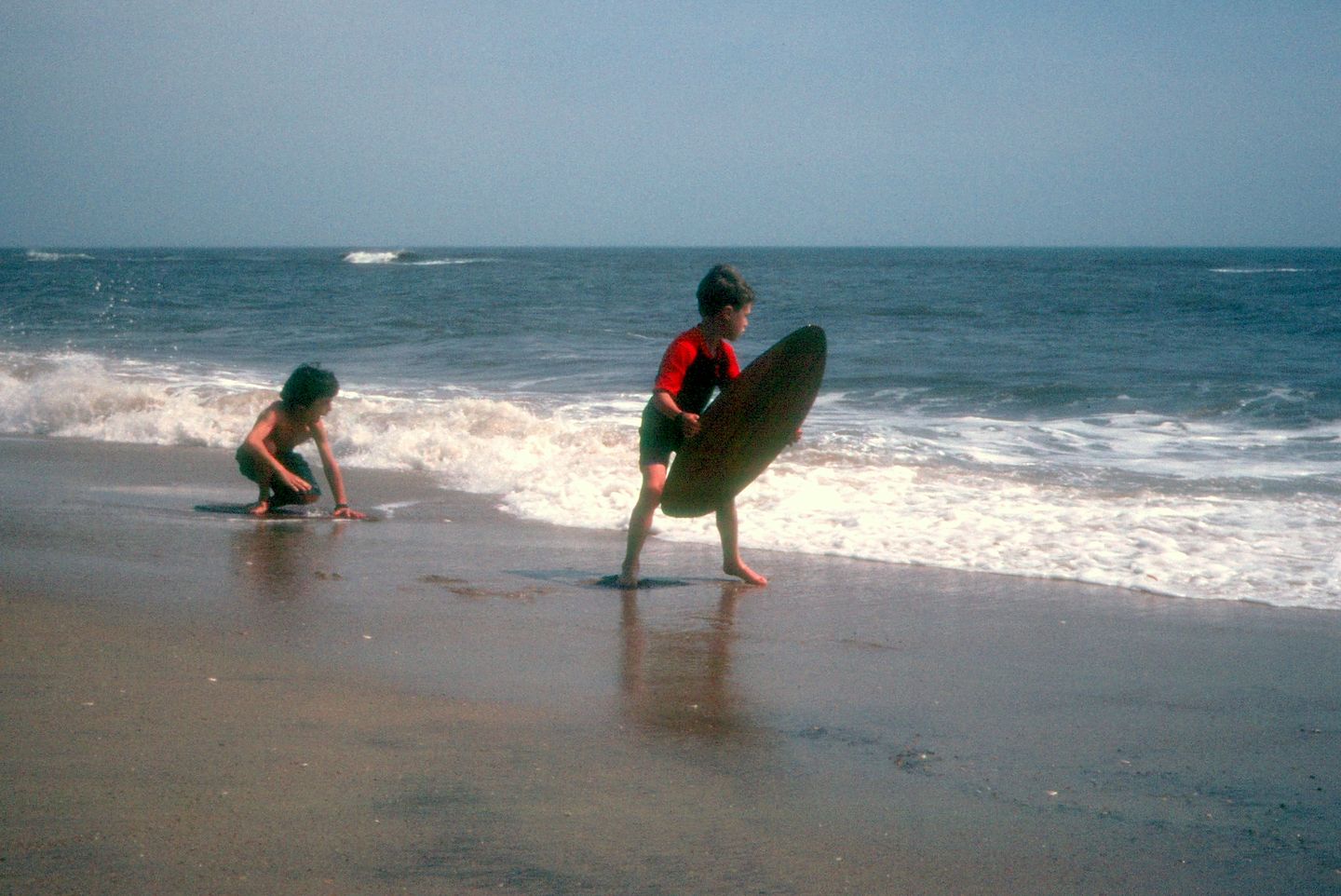 Determined skimboarders