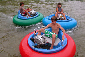 Lolo and boys in Bumper Boats