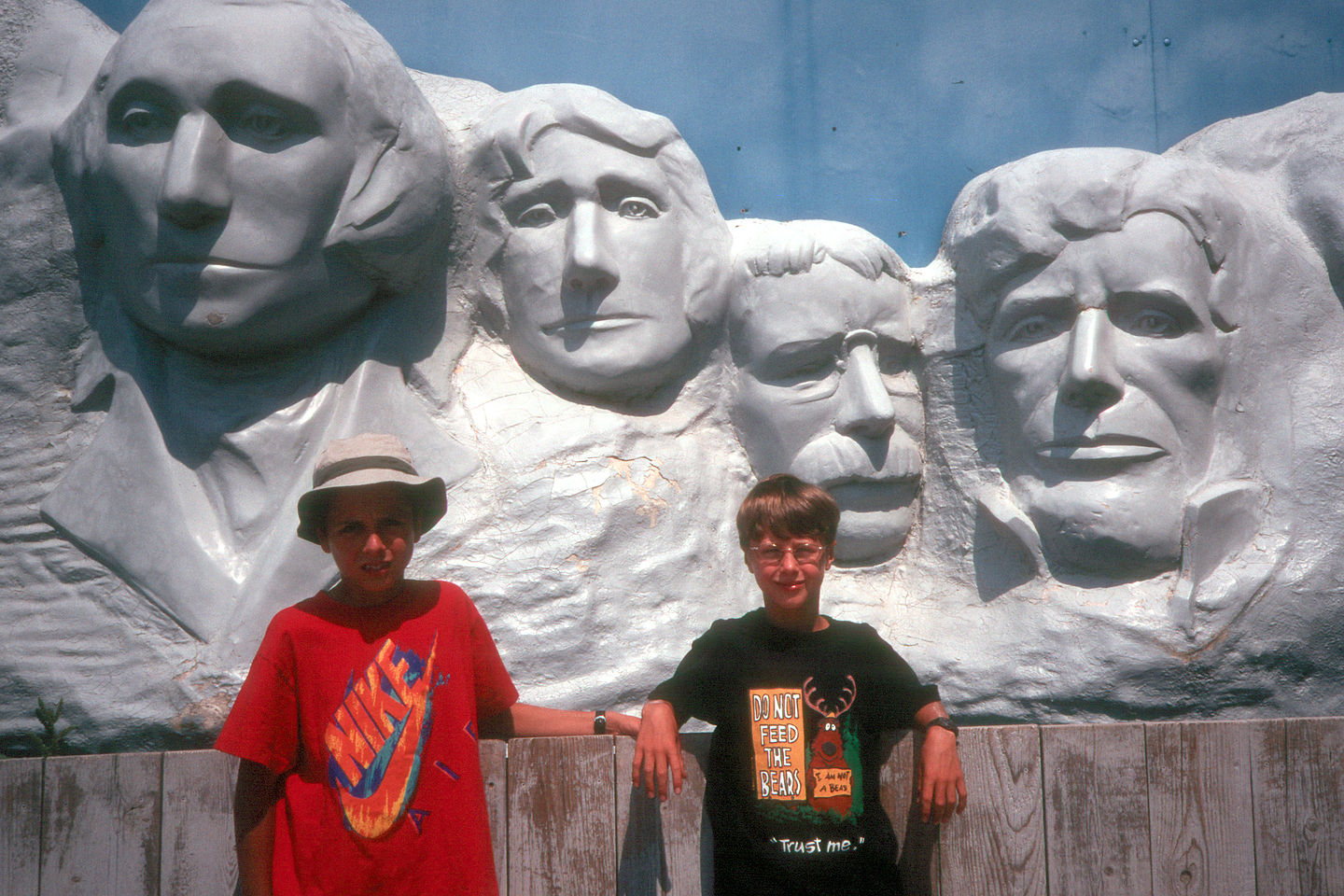 Boys in front of faux Mount Rushmore