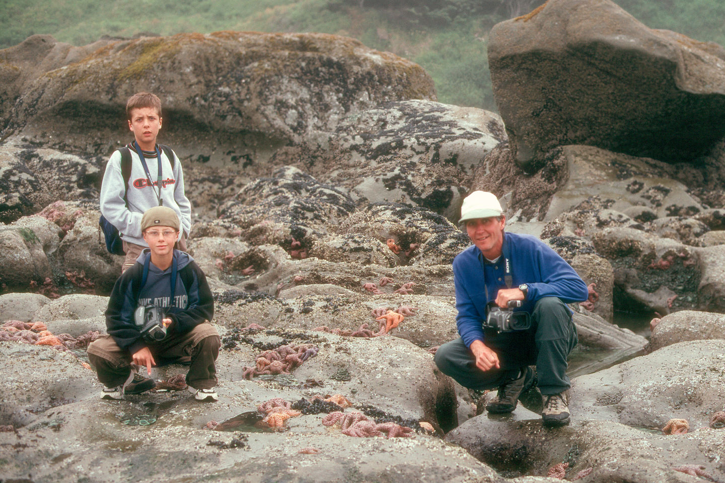 Herb and boys by tidal pools