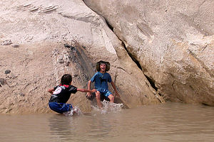 Boy's demonstrating use of the mudslide