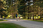 Boys running from Parc du Mont-Sainte-Anne Campground  