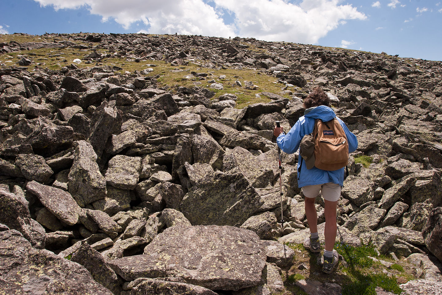 Lolo scrambling on talus