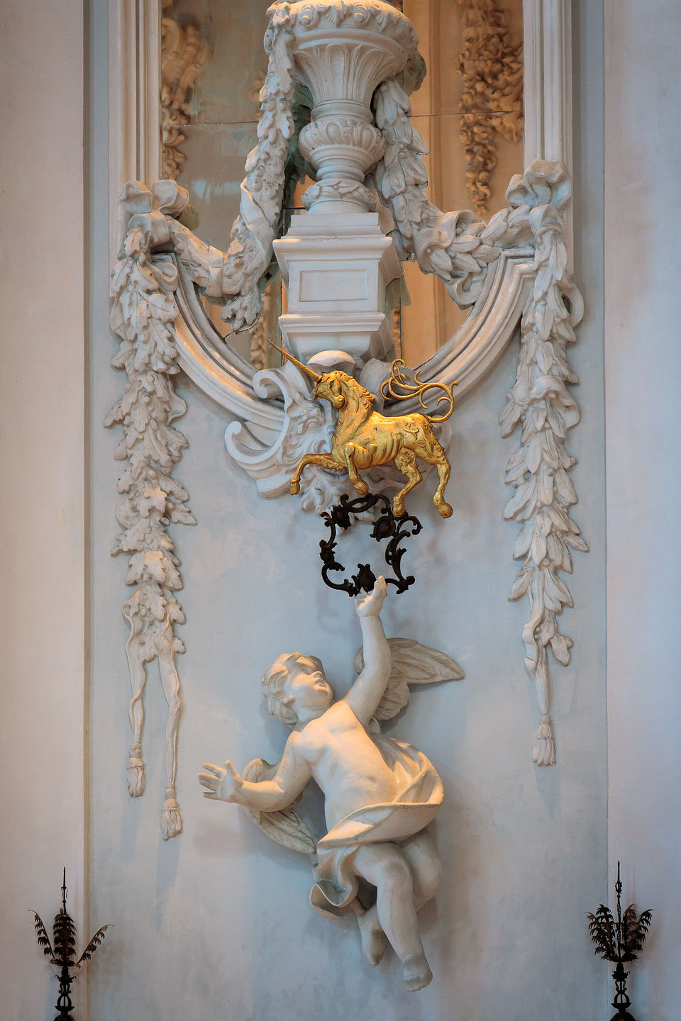 Putti holding a unicorn - the heraldic symbol of the Borromeos Putti holding a unicorn - the heraldic symbol of the Borromeos