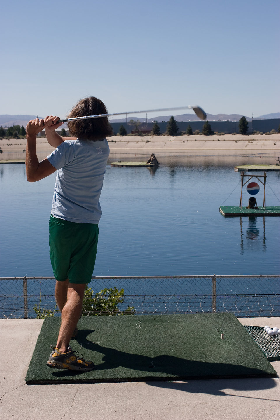 Andrew driving golf balls Andrew driving golf balls