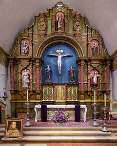 Carmel Mission Altar with portrait of Juniper Serra