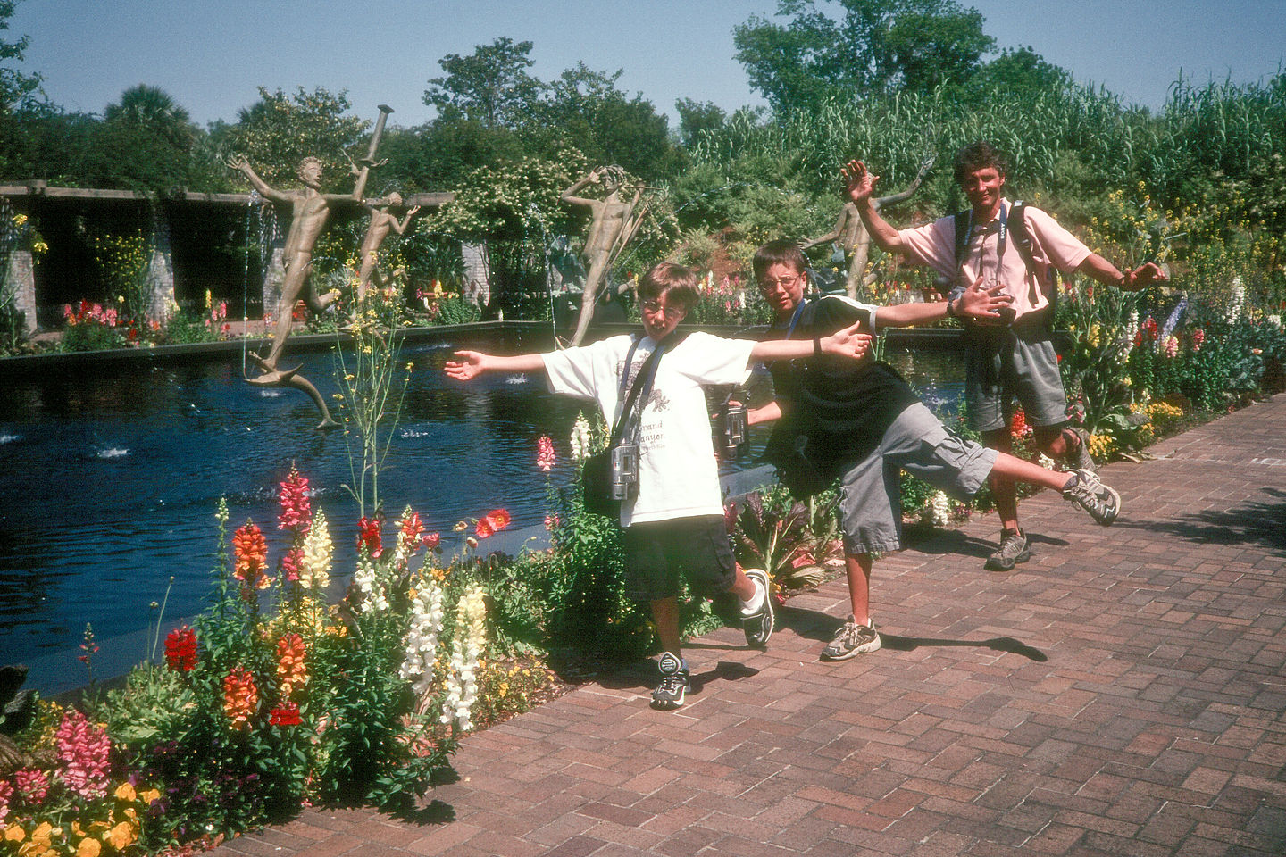 Herb and boys imitating statues