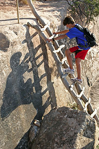 Tommy on the ladder to Sipapu Bridge