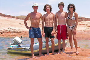 Family with trusty 21 year old Avon Redshank raft