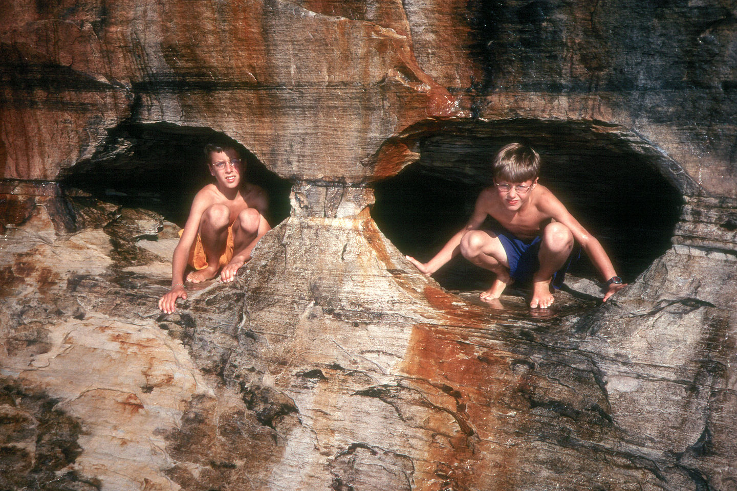 Boys in eyeglass sea caves