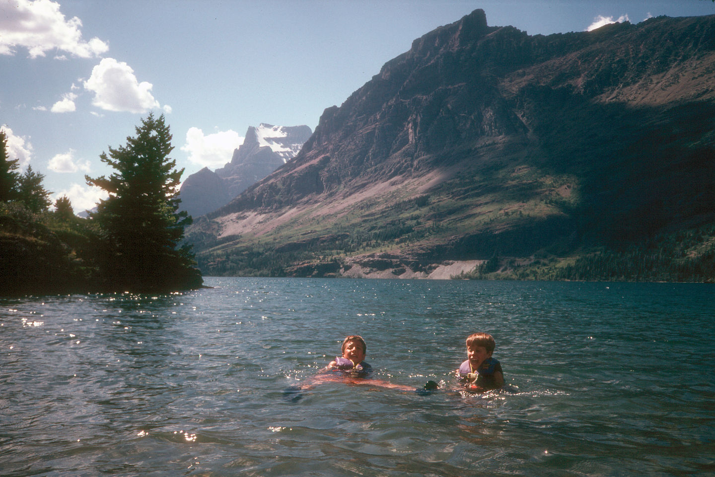 Boys braving the cold of St. Mary's Lake