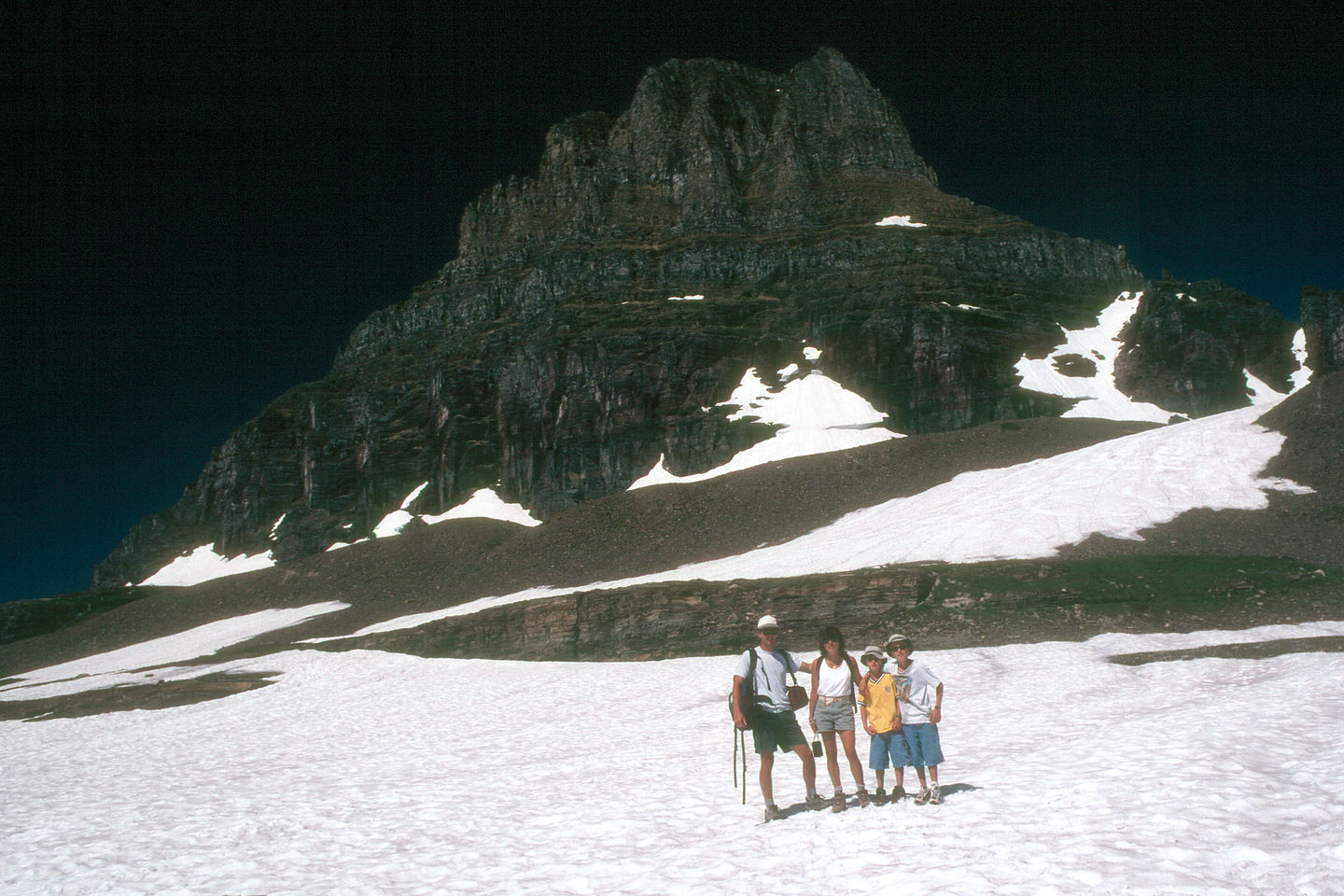 Family on glacier along Hidden Lake Trail Family on glacier along Hidden Lake Trail