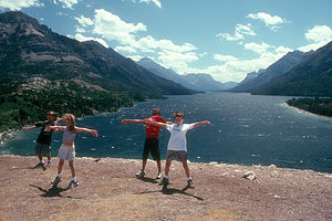 Kids in Wind on Bluff by Prince of Wales Hotel