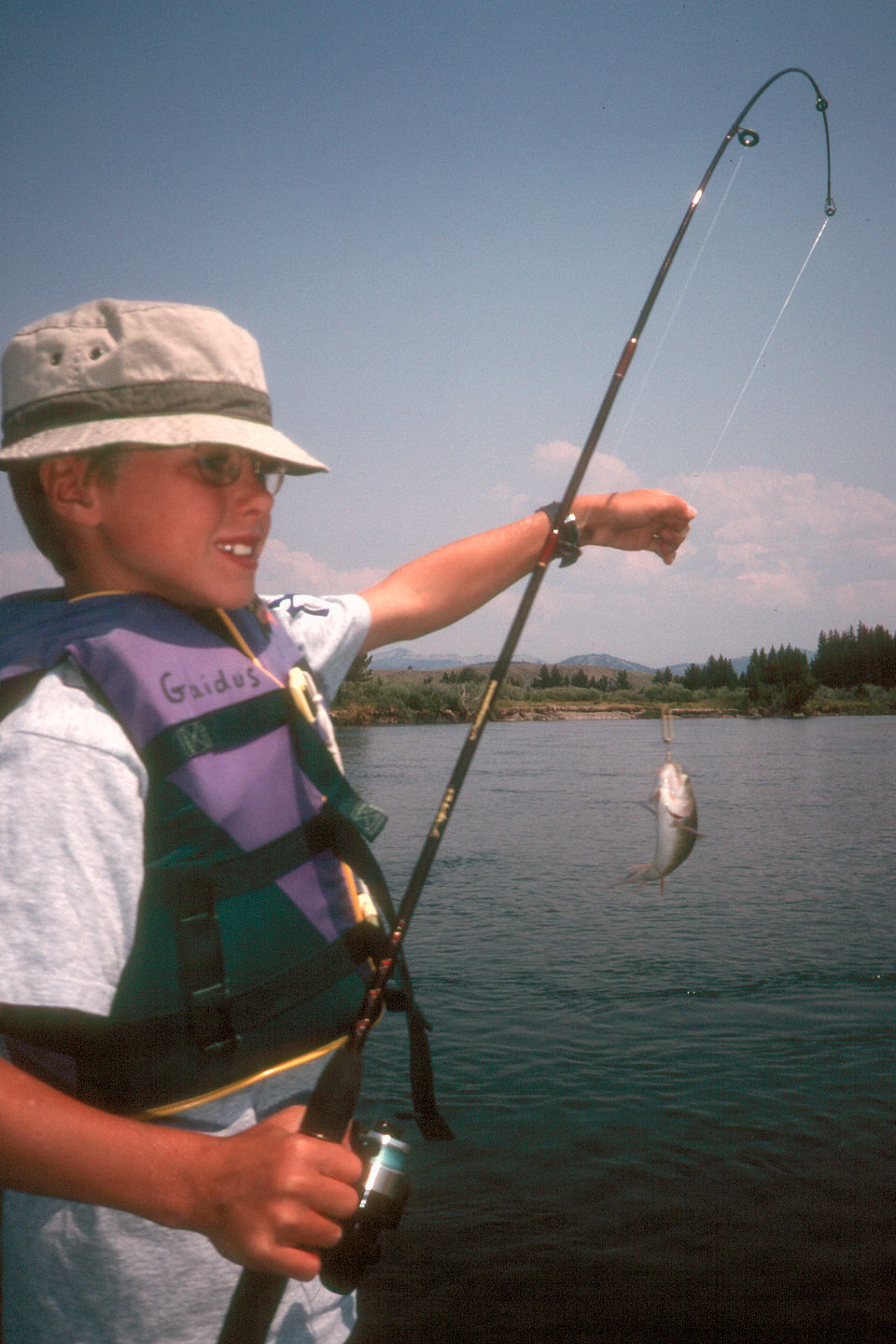 Tom with tiny fish Tom with tiny fish