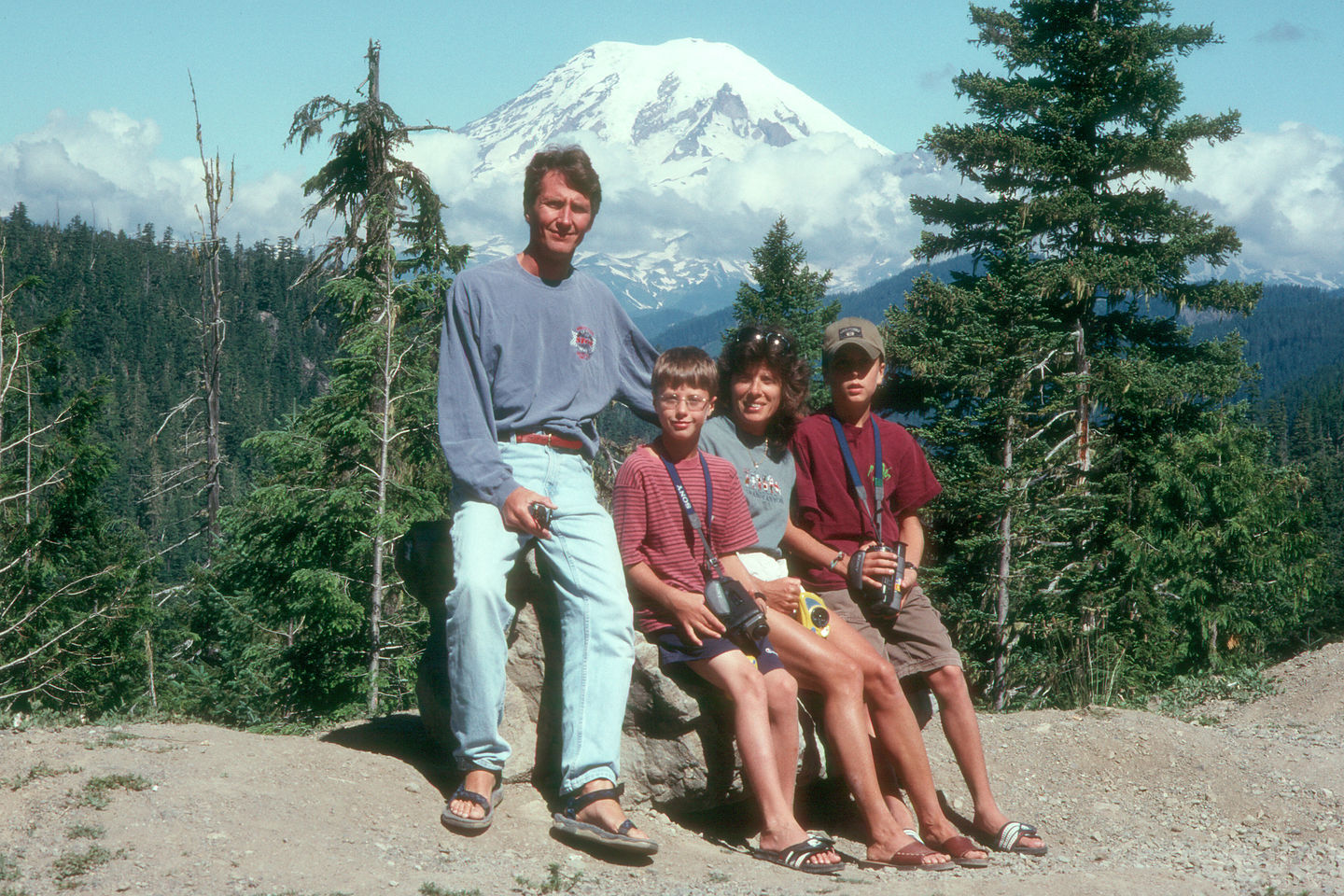 Family in front of the elusive Mt. Rainier Family in front of the elusive Mt. Rainier