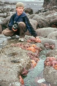 Tom with tidal pool starfish