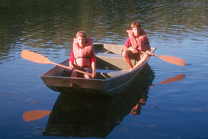 Boys rowing boat