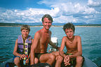 Herb and the boys on blowup boat in Heron Lake