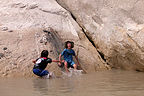 Boy's demonstrating use of the mudslide