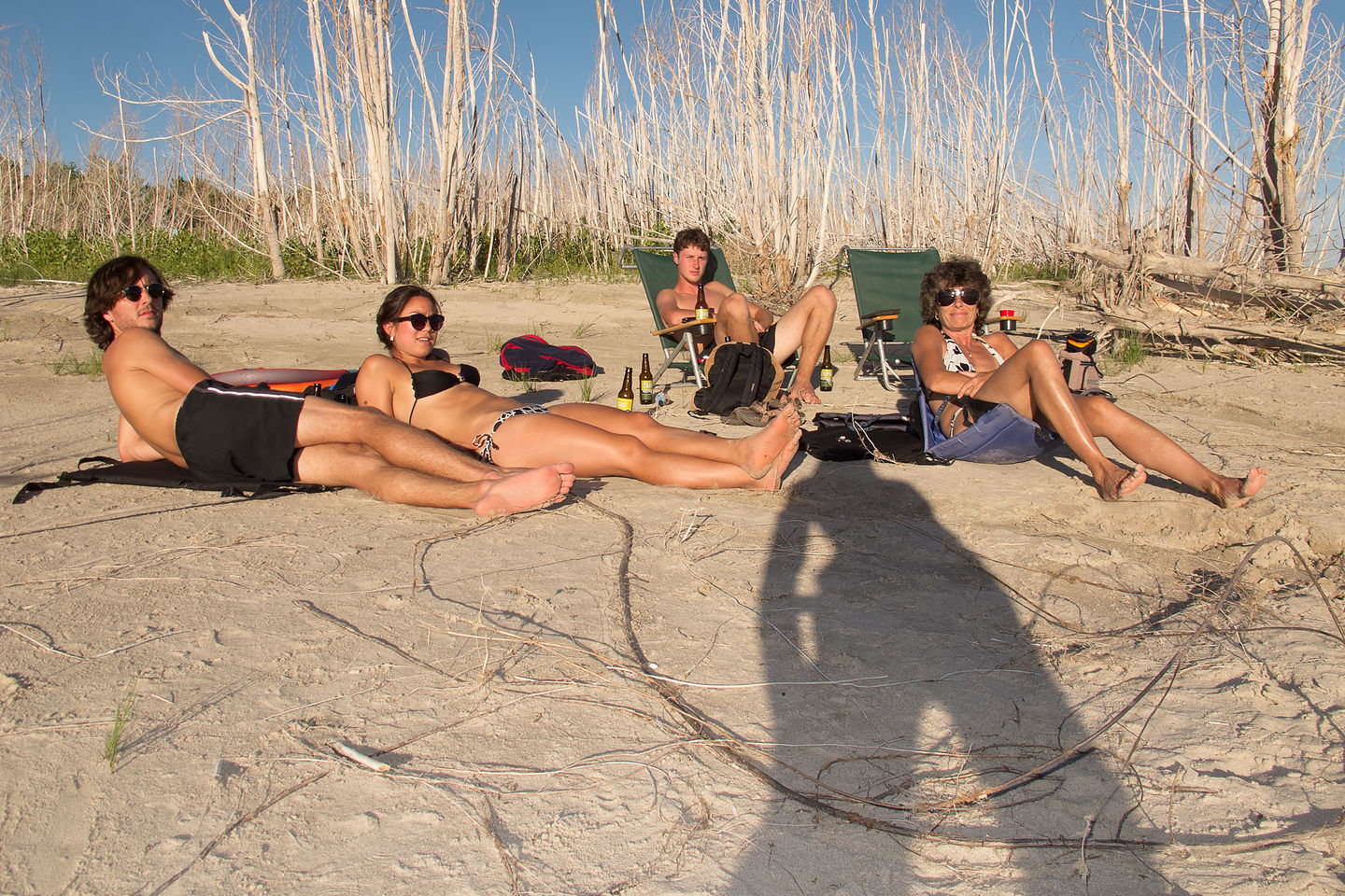 Relaxing on the beach after "Frisbee Pong" Relaxing on the beach after "Frisbee Pong"