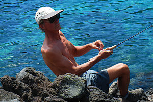 Herb catching a Trout at Fumarole Bay