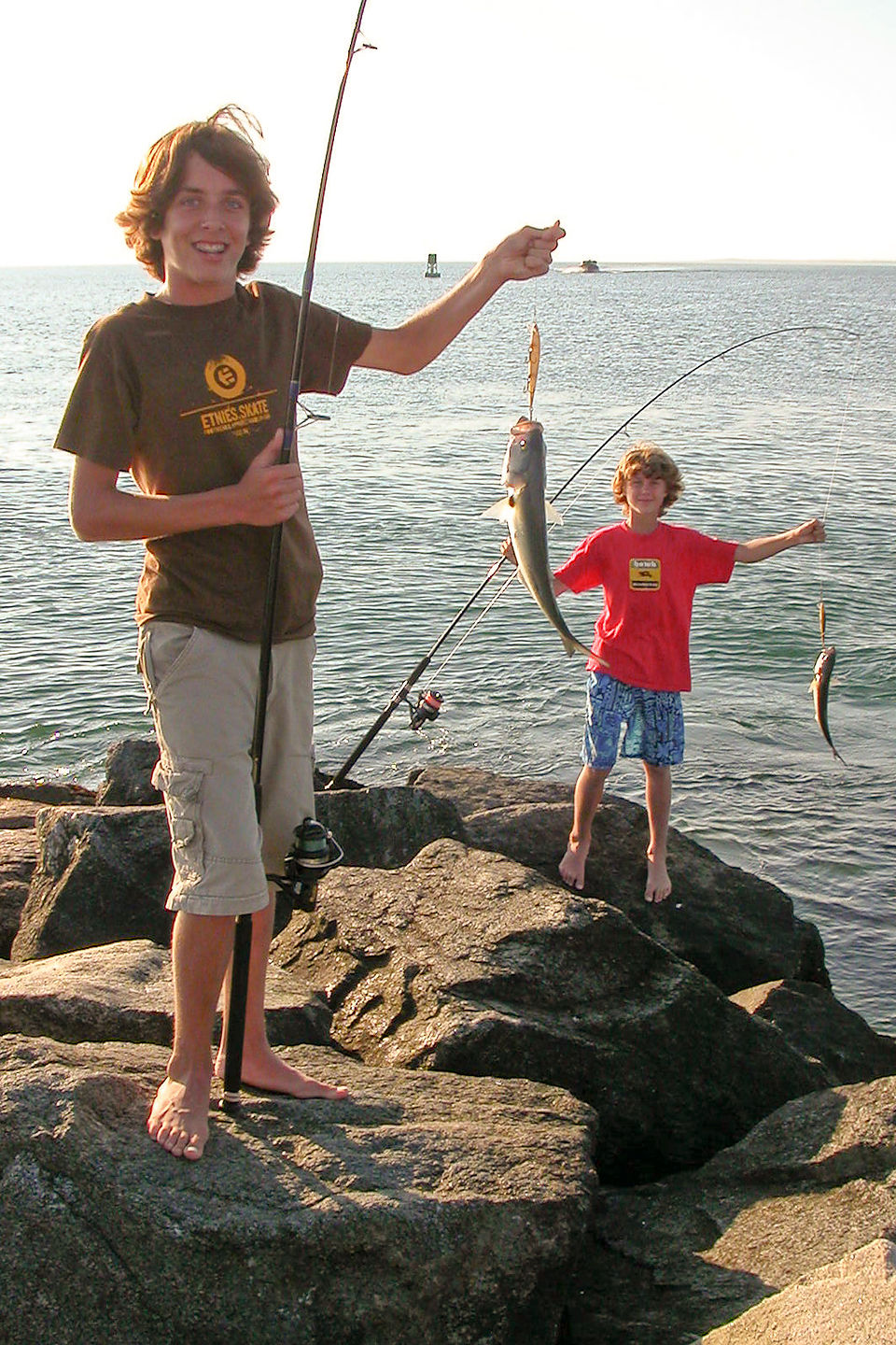 Boys catching fish from Jetty Boys catching fish from Jetty