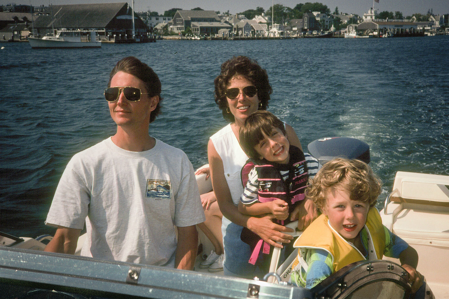 Family on Grady cruising Edgartown Harbor