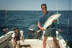 Herb with Boat Caught Striped Bass