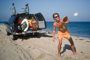 Herb playing catch on beach