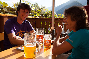 Tom and Lolo Enjoying Munchen Haus Beers