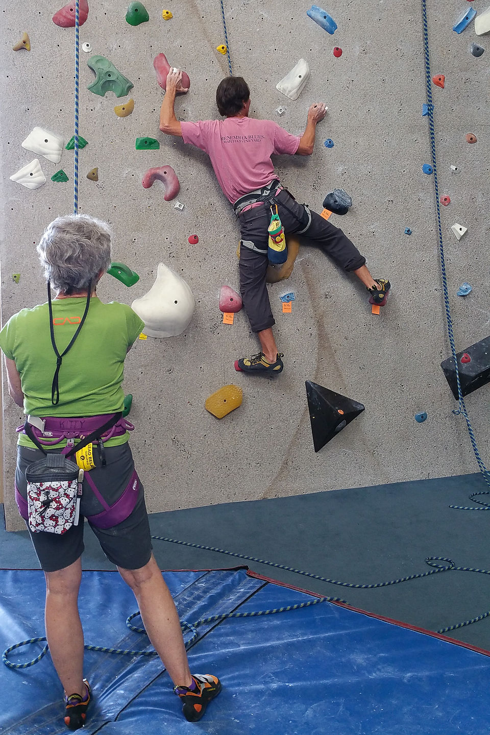 Kitty belaying Herb at Climb Iowa