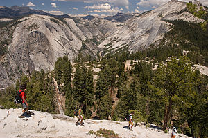 Lolo and boys descending Half Dome shoulder