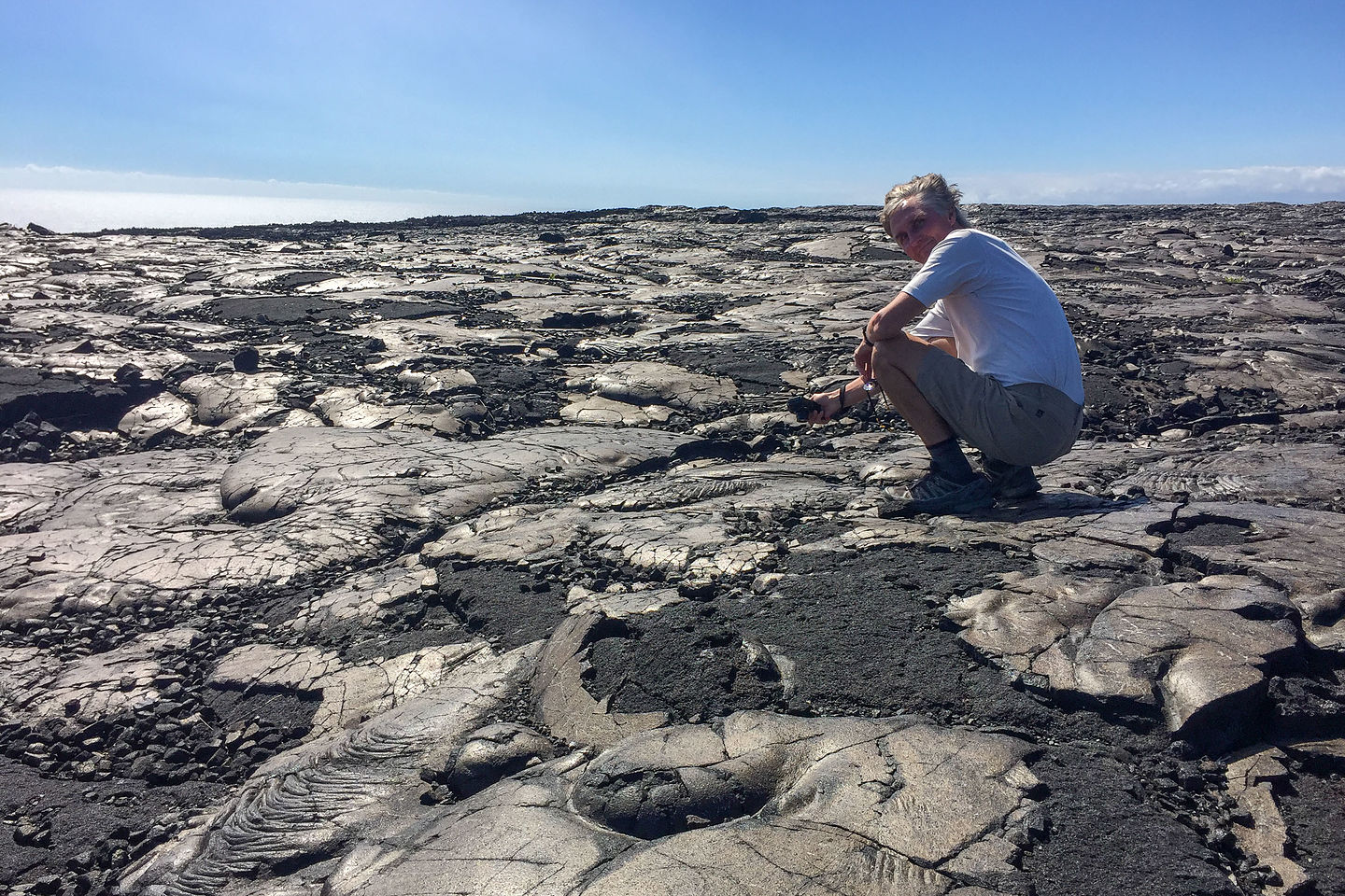 Herb playing with the lava at the end of Chain of Craters Road Herb playing with the lava at the end of Chain of Craters Road