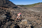 Lolo scrambling up to a Steam Vent in Kilauea Iki Crater 