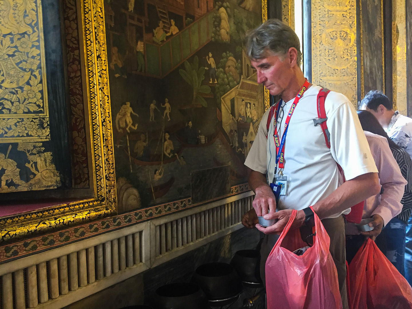 Herb giving alms at Wat Pho Herb giving alms at Wat Pho