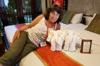 Lolo playing with her elephant towels in Legendha Sukhothai
