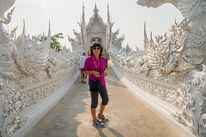 Lolo crossing the bridge of the "cycle of rebirth";