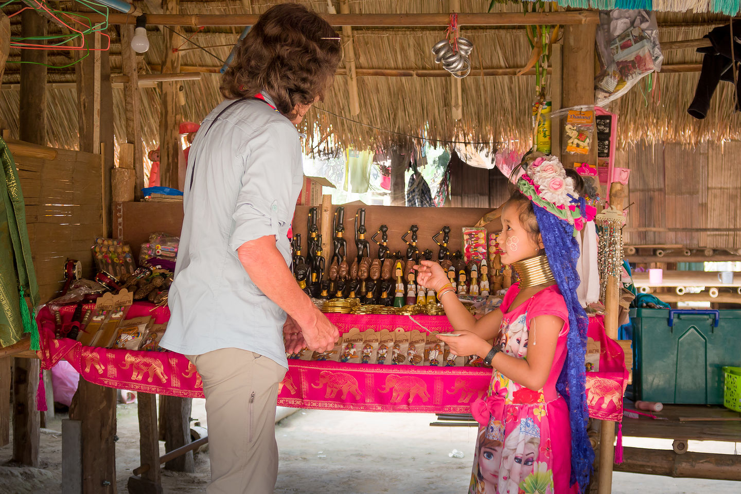 Lolo trying to haggle this little girl out of a few bahts Lolo trying to haggle this little girl out of a few bahts