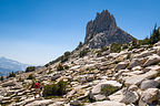 Lolo crossing the talus field to Unicorn Peak