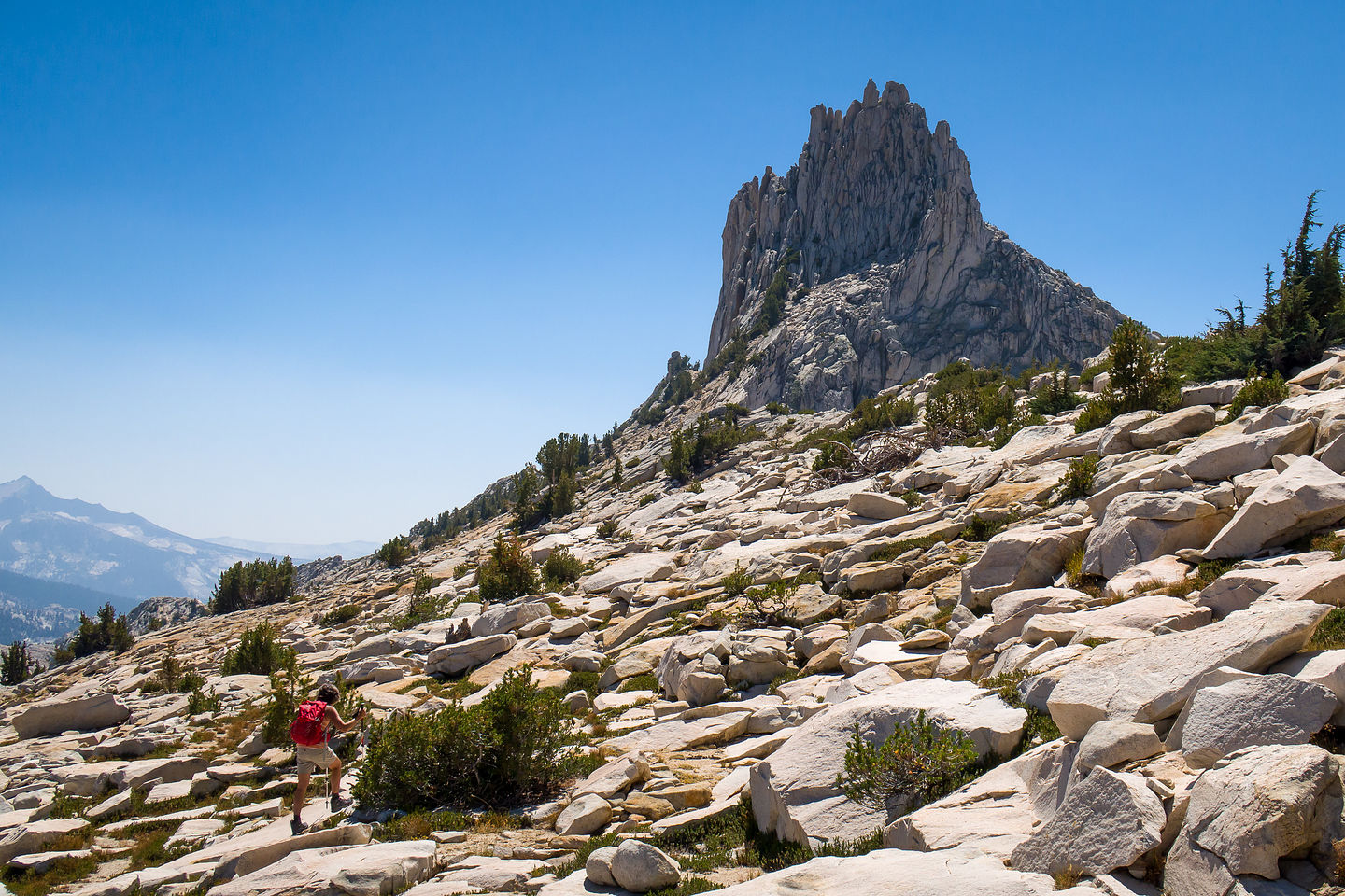 Lolo crossing the talus field to Unicorn Peak Lolo crossing the talus field to Unicorn Peak