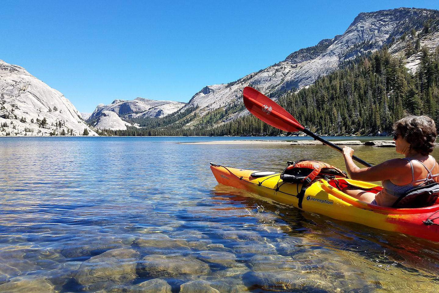 Lolo kayaking on Tenaya Lake