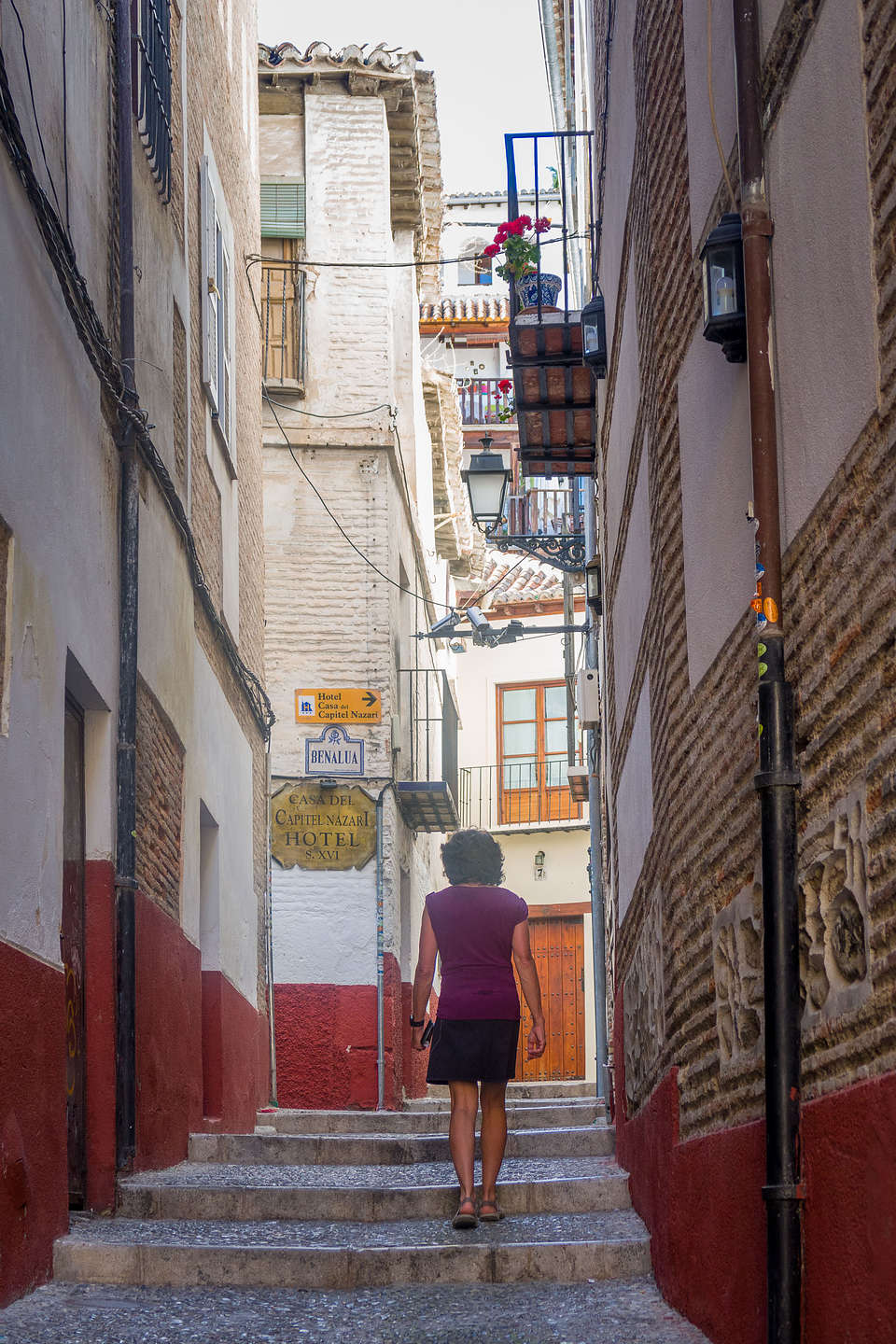 Lolo strolling up the steps of the Albaicin