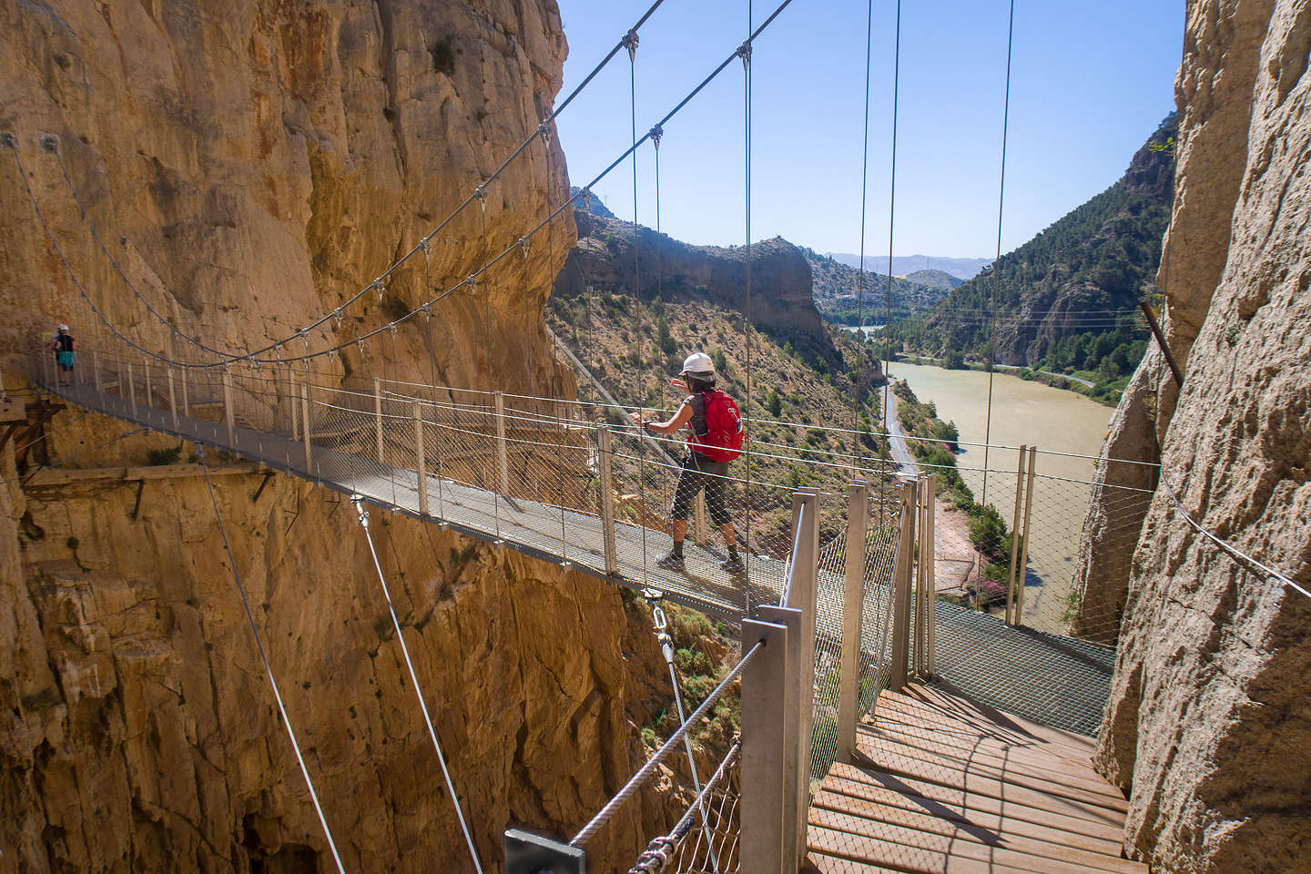 Lolo crossing over the windy suspension bridge Lolo crossing over the windy suspension bridge