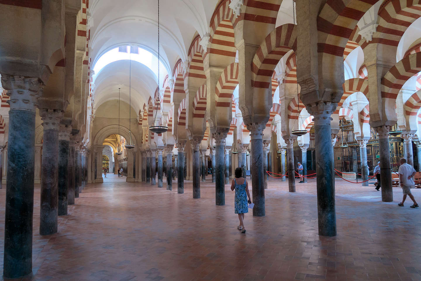 Lolo wandering along the forest of Islamic red-and-white arches Lolo wandering along the forest of Islamic red-and-white arches