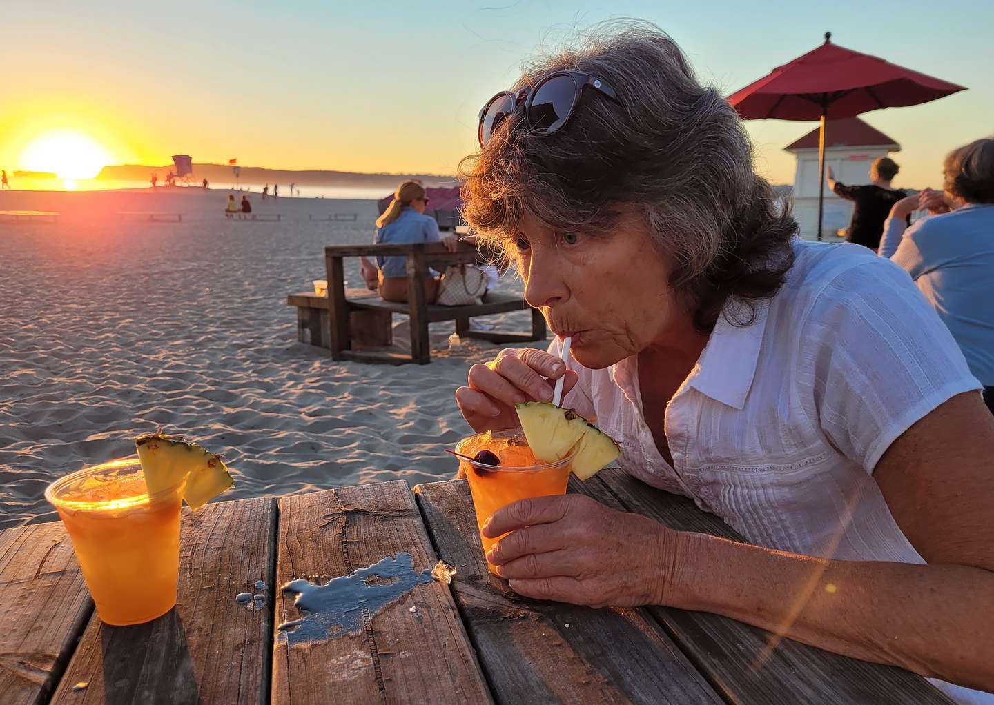 Lolo very much enjoying her exotic rum drink at the Hotel del Coronado