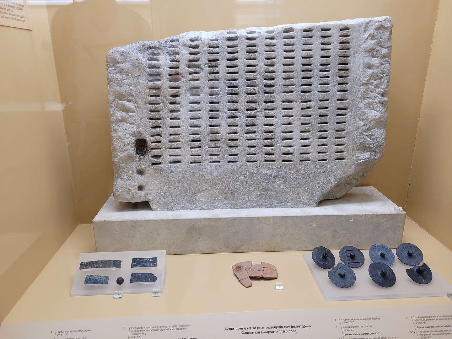 A kleroterion, ancient voting machine in the Agora Museum A kleroterion, ancient voting machine in the Agora Museum