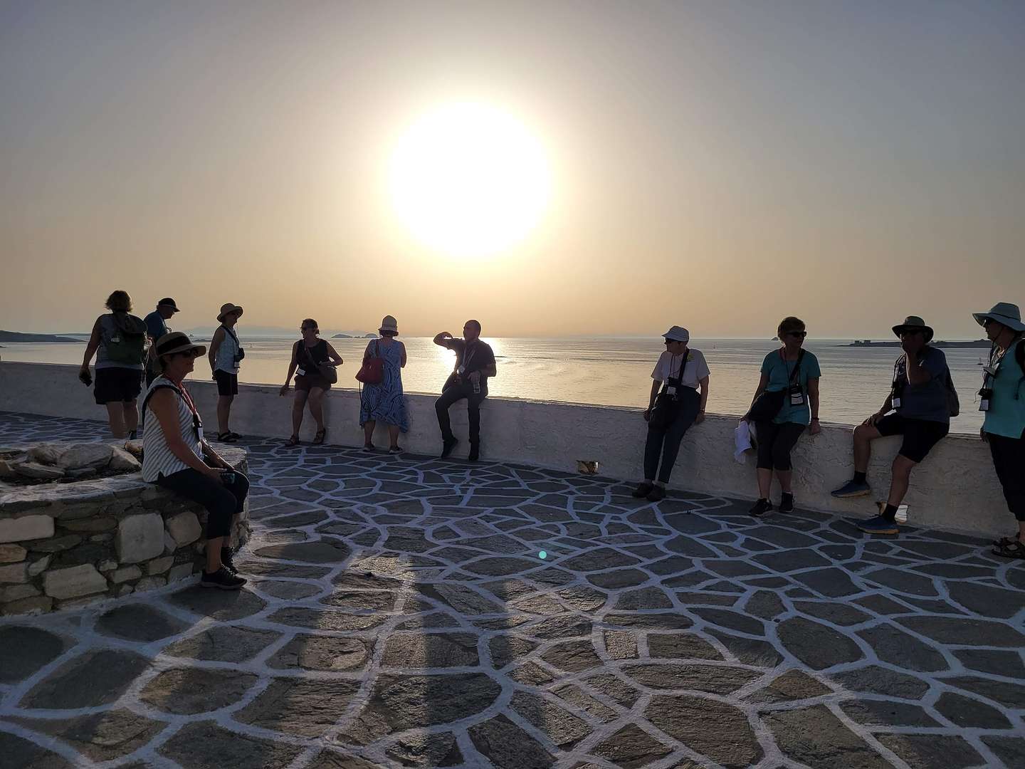 Tassos giving us a sunset lecture on the history of Paros