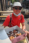 Herb enjoying his giant box of Voodoo Donuts