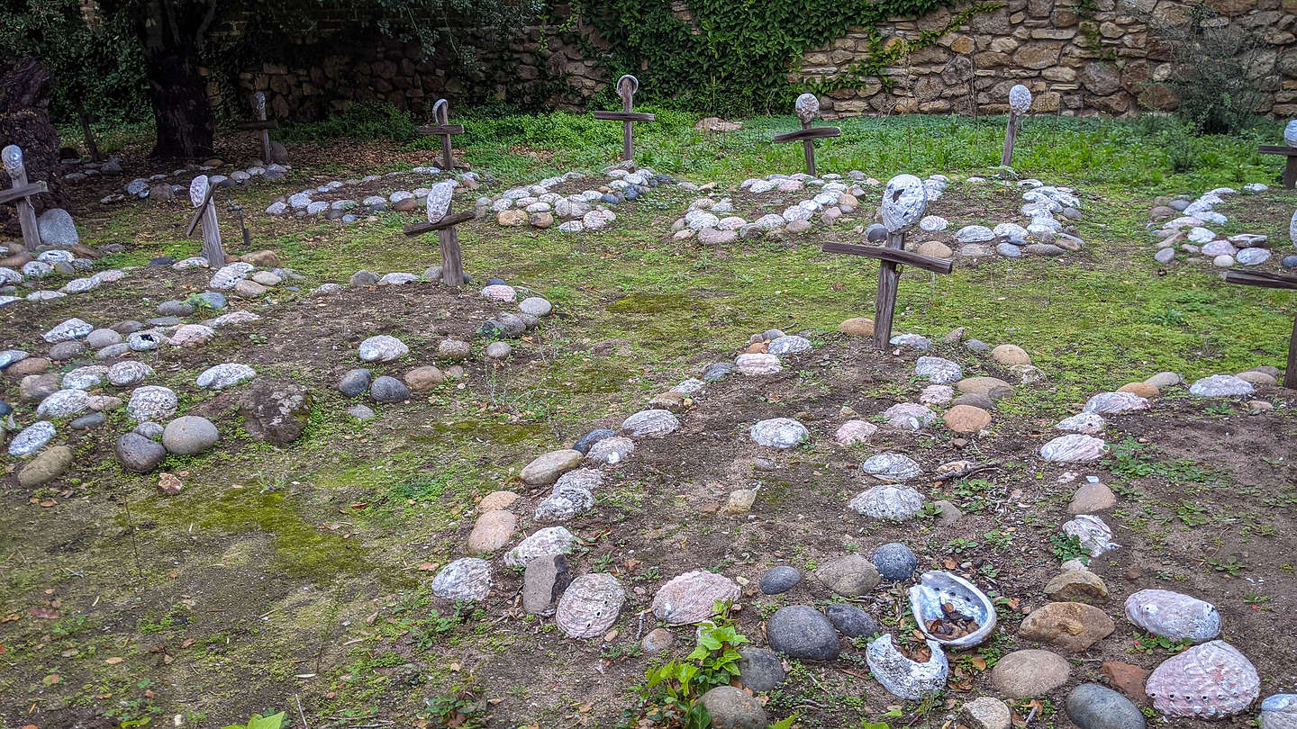 Unnamed graves marked by abalone shells, representing the indigenous people who died here Unnamed graves marked by abalone shells, representing the indigenous people who died here