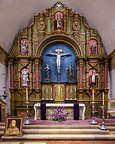 Carmel Mission Altar with portrait of Juniper Serra